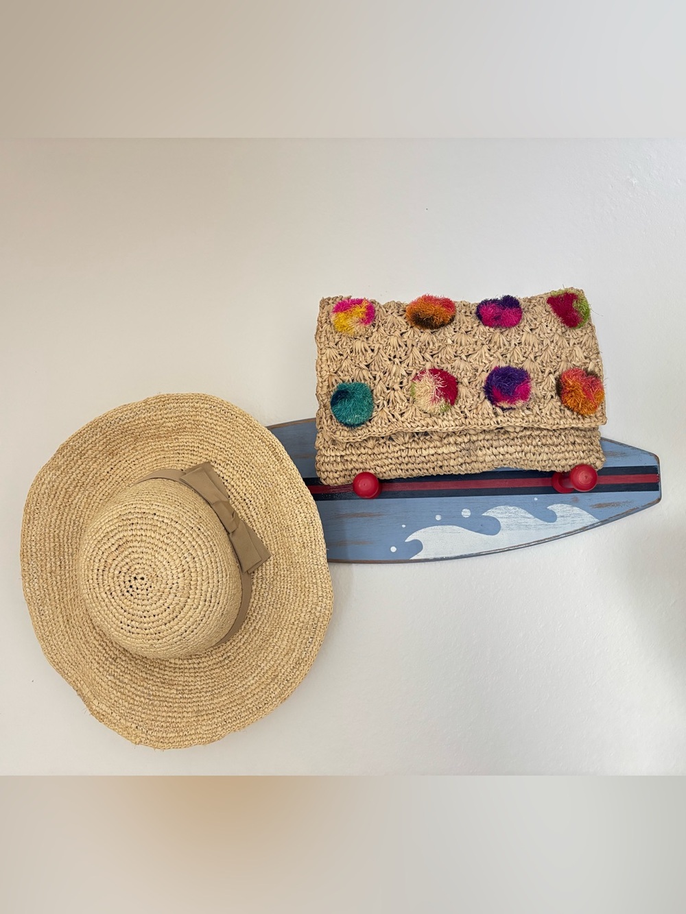 SERPUI Marie Woven Straw Pom Pom Clutch Bag Neutral Multi Color Boho